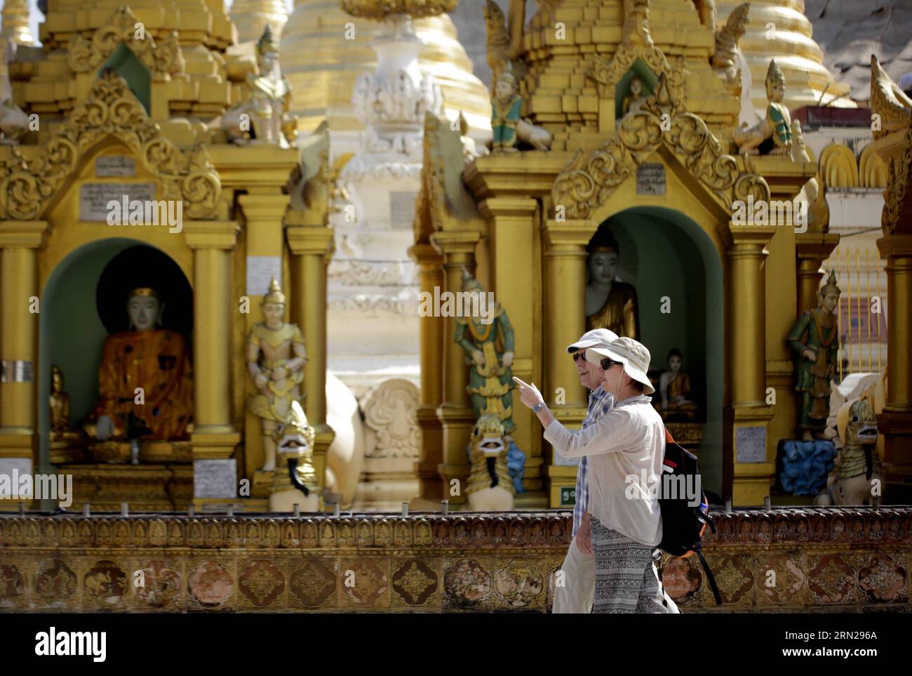 YANGON, Feb. 17, 2015 -- Tourists visit the Shwedagon pagoda in Yangon, Myanmar, Feb. 17, 2015. Shwedagon Pagoda is a repository of the best of Myanmar s heritages -- architecture, sculpture and arts. It consists of hundreds of colorful temples, stupas and statues that reflect architectural styles spanning almost 2,500 years. ) MYANMAR-YANGON-SHWEDAGON PAGODA UxAung PUBLICATIONxNOTxINxCHN   Yangon Feb 17 2015 tourists Visit The Shwedagon Pagoda in Yangon Myanmar Feb 17 2015 Shwedagon Pagoda IS a repository of The Best of Myanmar S heritage Architecture Sculpture and Arts IT consists of hundred Stock Photo