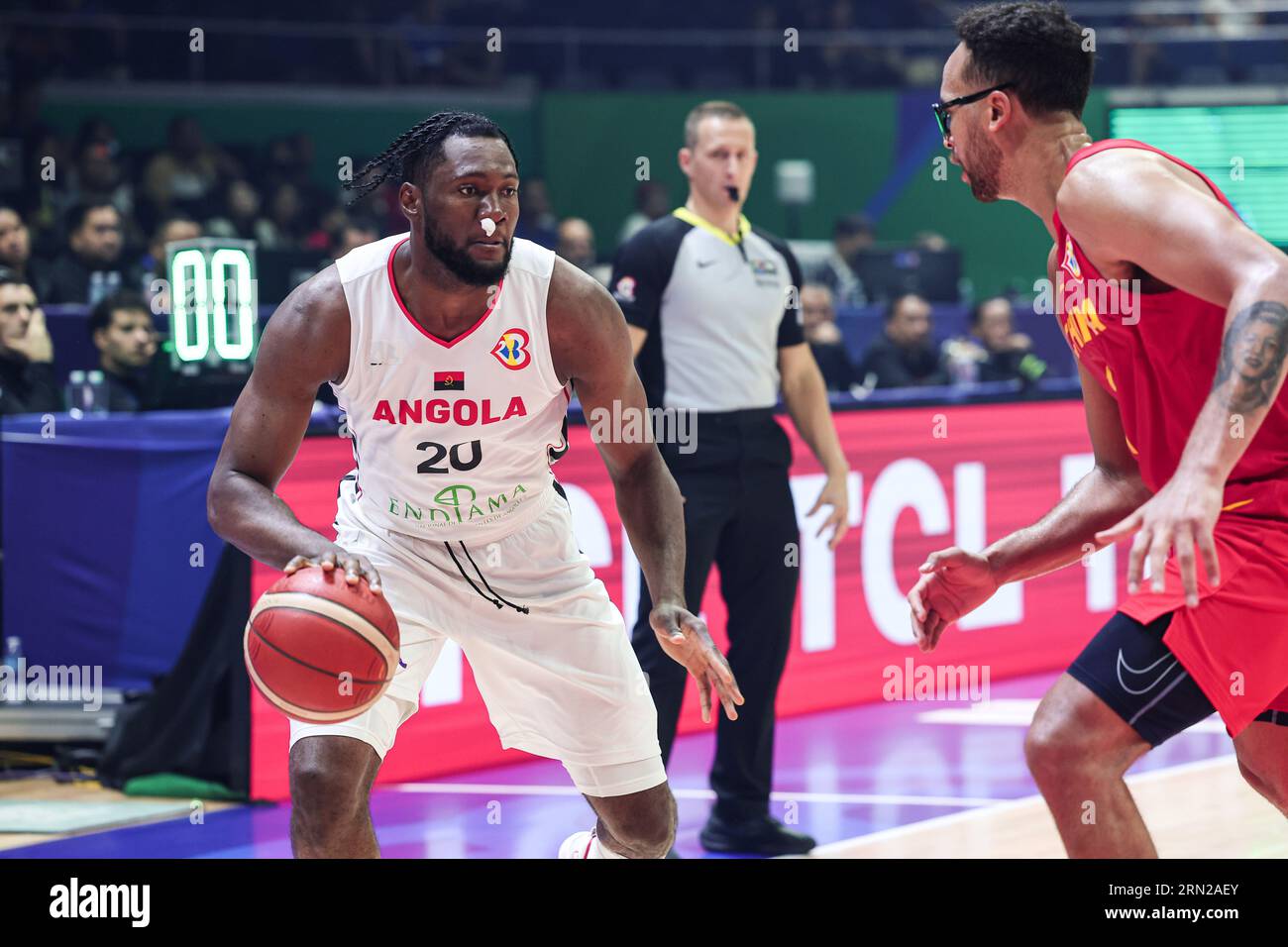 Manila, Philippines. 31st Aug, 2023. Bruno Fernando (L) of Angola competes during the classification round 17-32 match between China and Angola at the 2023 FIBA World Cup in Manila, the Philippines, on Aug. 31, 2023. Credit: Wu Zhuang/Xinhua/Alamy Live News Stock Photo
