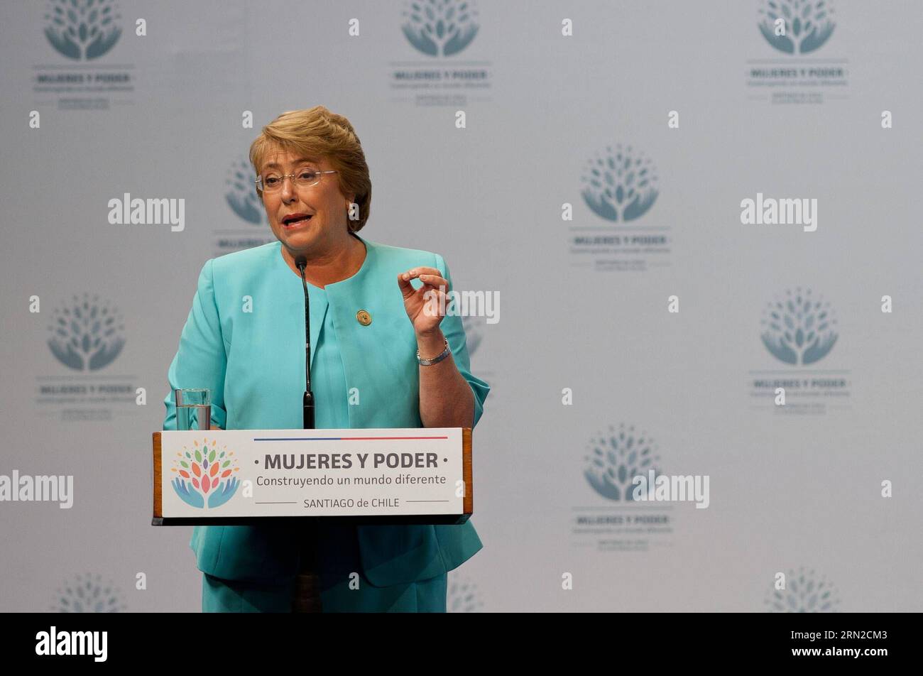 (150227) -- SANTIAGO, Feb. 27, 2015 -- Chile s President Michelle Bachelet delivers a speech during the Women in Power and Decision Making: Building a Different World forum opening ceremony, in Mapocho Station, in Santiago, capital of Chile, on Feb. 27, 2015. Women in Power and Decision Making: Building a Different World forum held on Feb. 27 and 28 was organized by Ministry of Foreign Affairs and the National Women s Service of Chilean Government, in collaboration with the UN Women entity, according to local press. Jorge Villegas) (jg) CHILE-SANTIAGO-UN-FORUM e JORGExVILLEGAS PUBLICATIONxNOTx Stock Photo