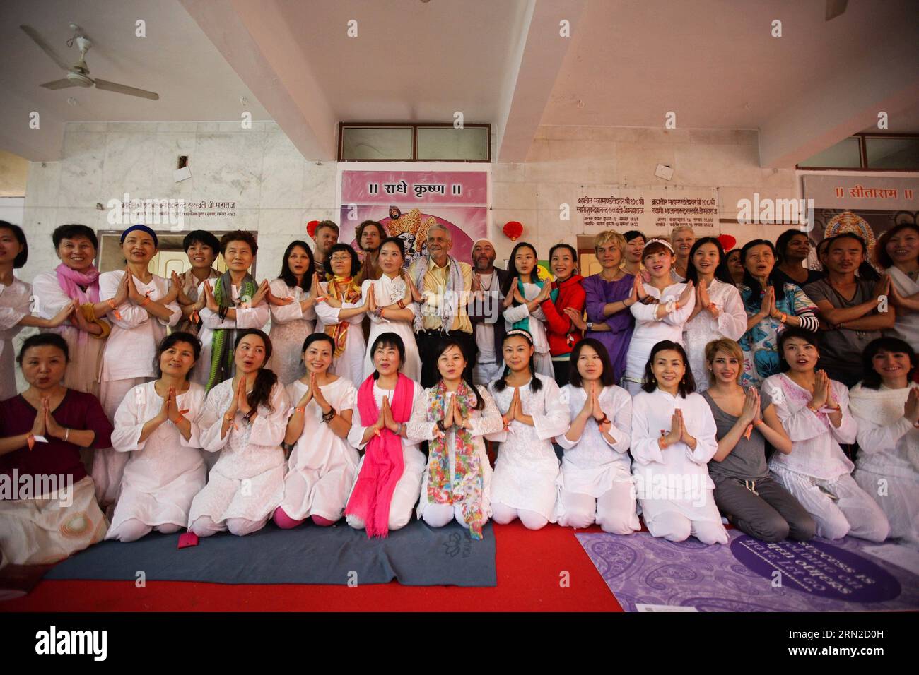 (150228) -- RISHIKESH, Feb. 28, 2015 -- Yoga practitioners pose for photo after a Chinese yoga session in Parmarth Niketan Ashram of Rishikesh, Uttarakhand of India, Feb. 28, 2015. A group of Chinese yoga practitioners came to Rishikesh, sometimes nicknamed The World Capital of Yoga , on Saturday to participate the International Yoga Festival to be inaugurated the next day. )(bxq)(bxq) INDIA-RISHIKESH-YOGA-CHINESE ZhengxHuansong PUBLICATIONxNOTxINxCHN   Rishikesh Feb 28 2015 Yoga Practitioners Pose for Photo After a Chinese Yoga Session in   Ashram of Rishikesh Uttarakhand of India Feb 28 2015 Stock Photo