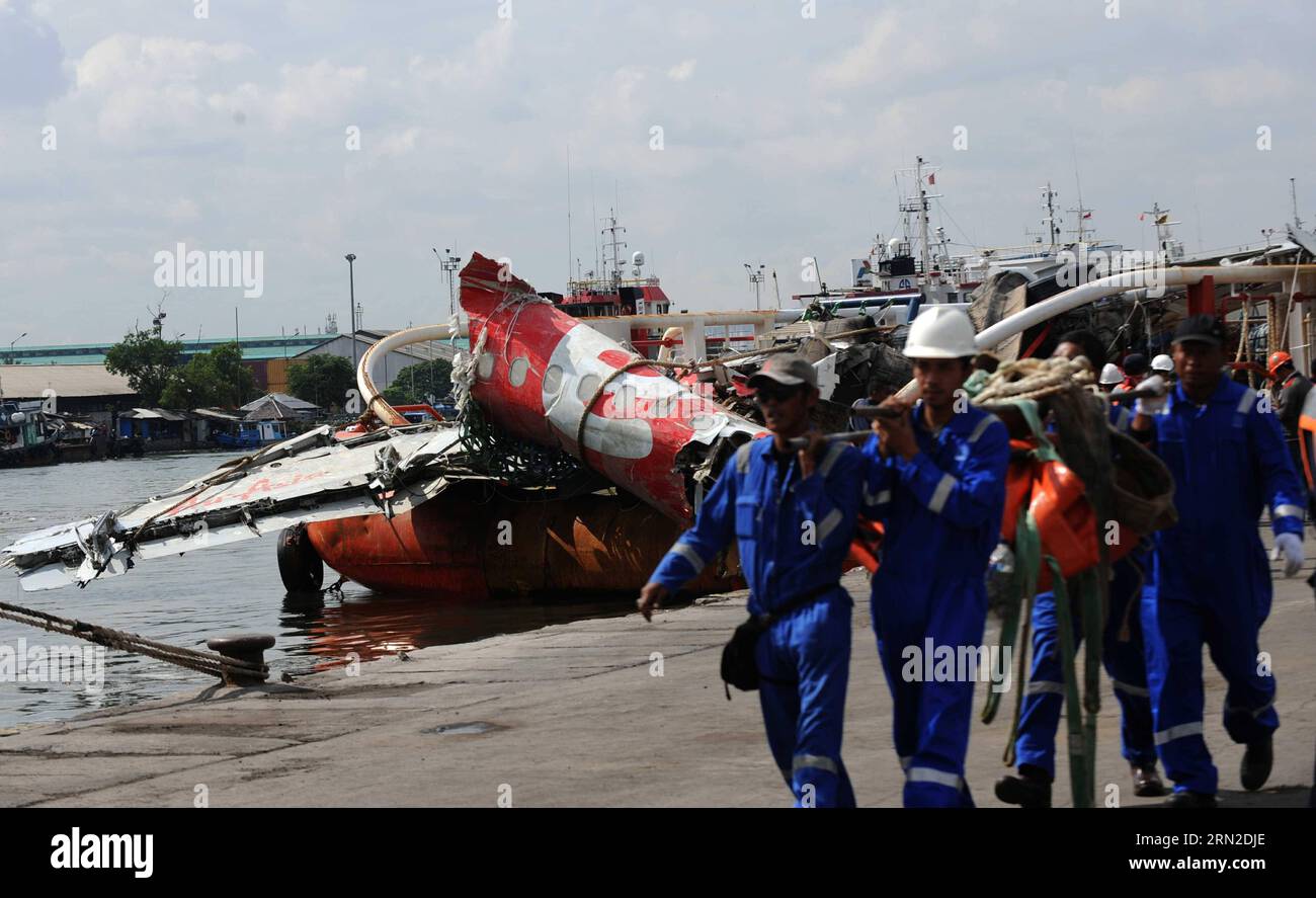 (150302) -- JAKARTA, March 2, 2015 -- A large part of AirAsia QZ 8501 fuselage is lifted from the rescue ship Crest Onyx at Tanjung Priok harbor in Jakarta, Indonesia, March 2, 2015. Indonesian officials said on Saturday that the final major part of the fuselage of the AirAsia QZ 8501 has been retrieved. AirAsia QZ 8501 was crashed in Karimata Strait enroute from Indonesia s city of Surabaya for Singapore on Dec. 28, killing all 162 people onboard. ) INDONESIA-JAKARTA-AIRASIA-PLANE-RETRIEVAL AgungxKuncahyaxB. PUBLICATIONxNOTxINxCHN   Jakarta March 2 2015 a Large Part of AirAsia  8501 fuselage Stock Photo