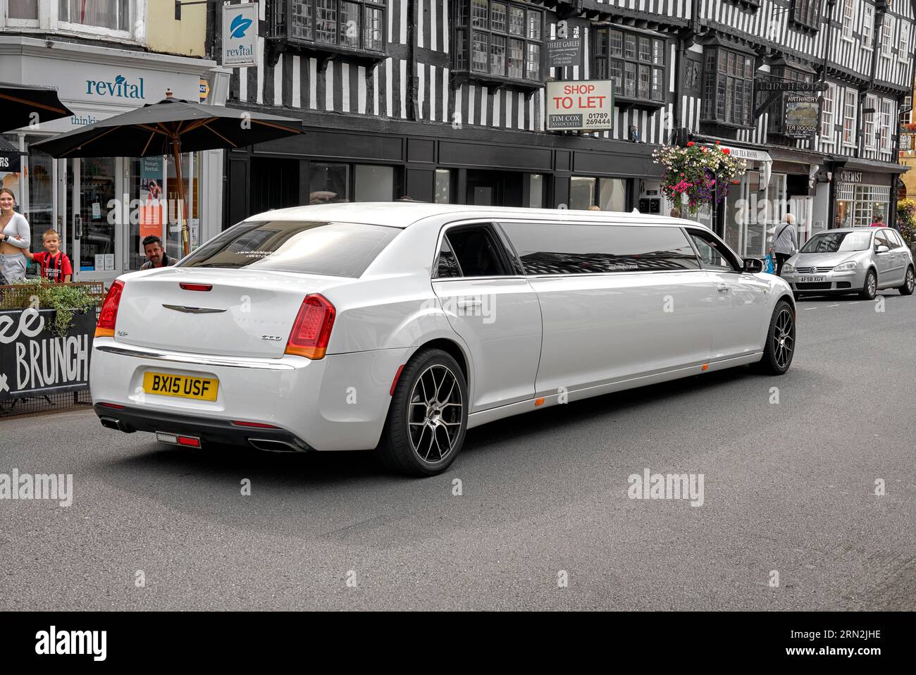 Stretched Limousine Chrysler 300 in white Stock Photo