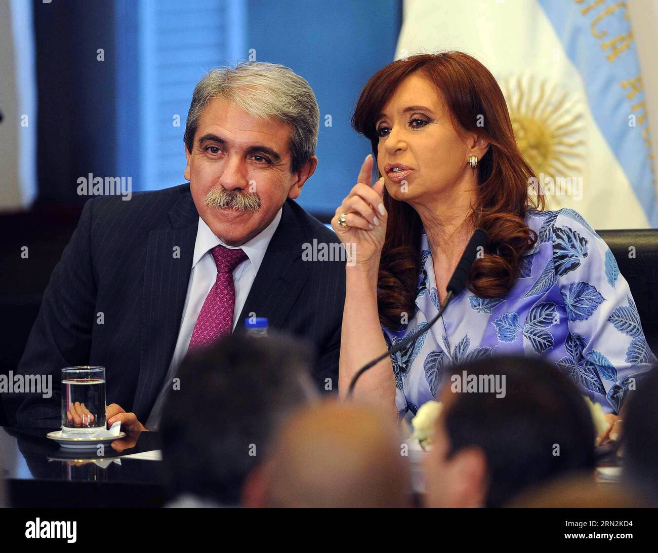 BUENOS AIRES, March 12, 2015 -- Argentina s President Cristina Fernandez de Kirchner (R) talks with Anibal Fernandez (L), head of Ministers Cabinet, during an act at Casa Rosada, in Buenos Aires, Argentina, on March 12, 2015. Cristina Fernandez de Kirchner announced Thursday an increase in grants and scholarships for middle and high schools students, according to local press. Raul Ferrari/TELAM) (dh) ARGENTINA-BUENOS AIRES-POLITICS-FERNANDEZ TELMA PUBLICATIONxNOTxINxCHN   Buenos Aires March 12 2015 Argentina S President Cristina Fernandez de Kirchner r Talks With Anibal Fernandez l Head of Min Stock Photo