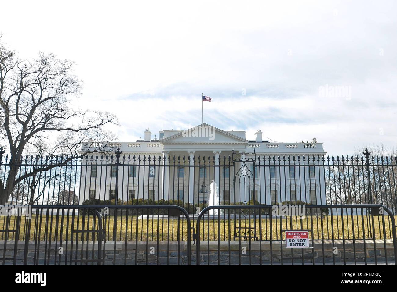 (150313) -- WASHINGTON D.C., March 13, 2015 -- Photo taken on March 13, 2015 shows the fence with Do Not Enter signs around the White House in Washington D.C., capital of the United States. For a U.S. federal agency with a name that suggests secrecy, putting itself repeatedly in the limelight for negative news coverage is quite a bitter irony. The Secret Service, widely perceived as the most elite law enforcement team in the United States that protects the U.S. president and the First Family, landed itself in hot water again after U.S. media revealed earlier this week that two top Secret Servi Stock Photo