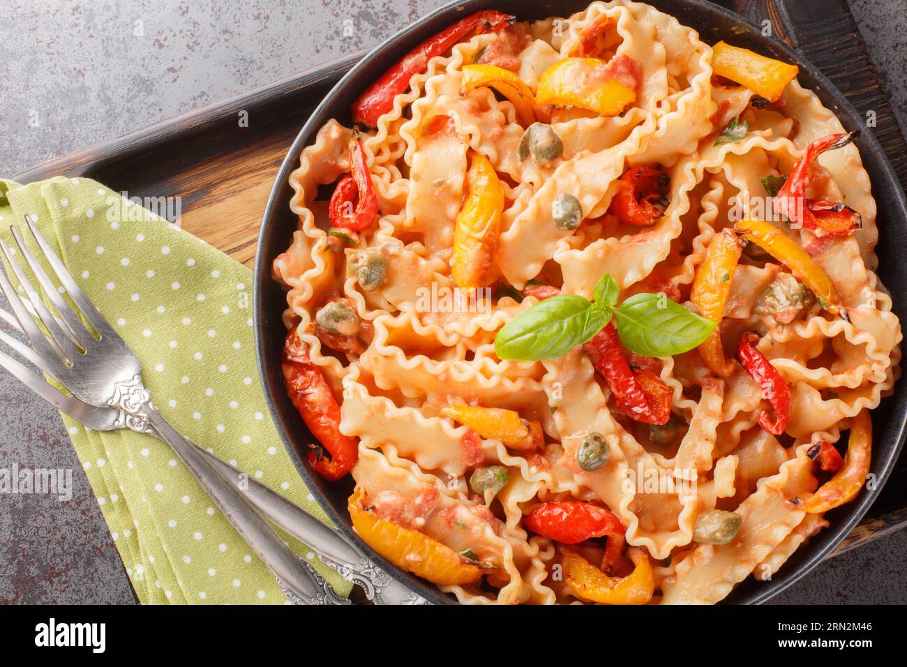 Mafalde Pasta Ribbons Ribbon-shaped Italian pasta mafaldine cooked with creamy tomato sauce ...