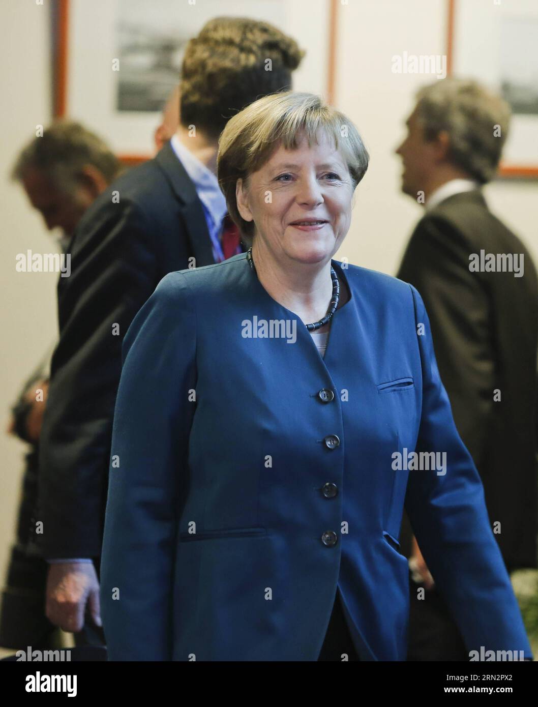 (150320) -- BRUSSELS, March 20, 2015 -- German Chancellor Angela Merkel arrives to attend a press conference after the European Union (EU) summit at the EU headquarters in Brussels, Belgium, on March 20, 2015. European leaders agreed to create an Energy Union during a summit meeting in Brussels and set out the first steps by accelerating the connection of national pipelines and electricity grids. Zhou Lei) BELGIUM-EU-SPRING SUMMIT ?? PUBLICATIONxNOTxINxCHN   Brussels March 20 2015 German Chancellor Angela Merkel arrives to attend a Press Conference After The European Union EU Summit AT The EU Stock Photo