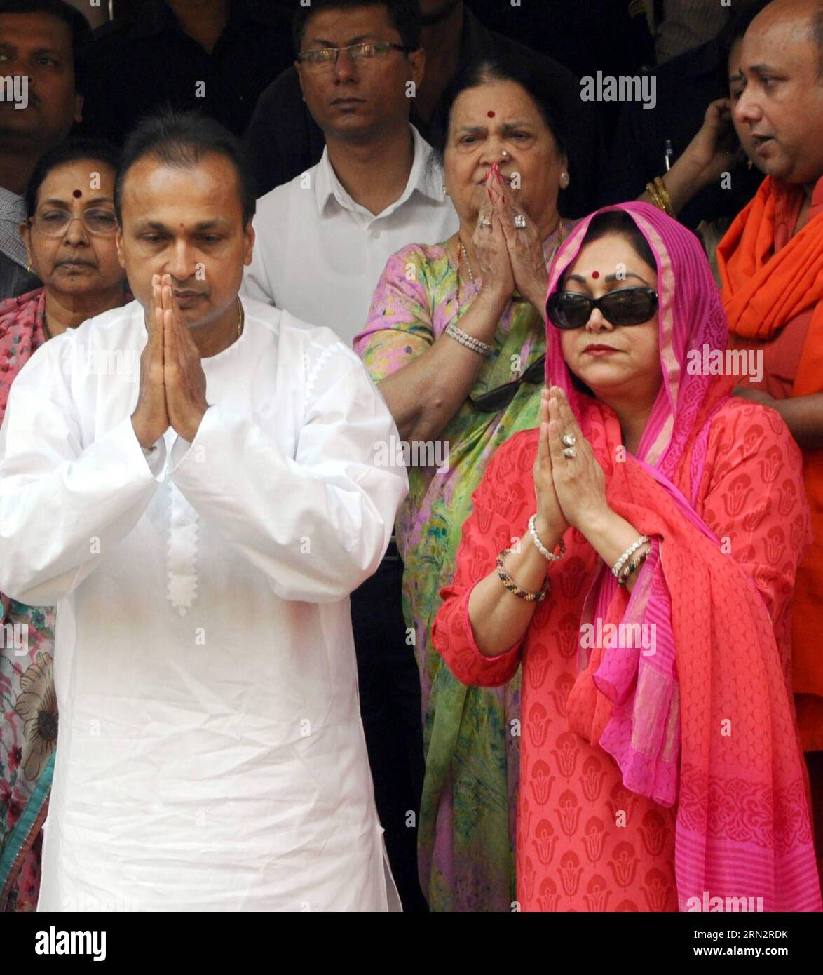 (150321) -- GUWAHATI, March 21, 2015 -- Indian business tycoon Anil Dhirubhai Ambani (L, front) and his wife Tina Ambani (R, front) offer prayers at the famous Kamakhya Temple in Guwahati, capital of India s northeastern state of Assam, March 21, 2015. ) INDIA-GUWAHATI-ANIL DHIRUBHAI AMBANI-KAMAKHYA TEMPLE Stringer PUBLICATIONxNOTxINxCHN   Guwahati March 21 2015 Indian Business Tycoon Anil   l Front and His wife Tina  r Front OFFER Prayers AT The Famous Kamakhya Temple in Guwahati Capital of India S Northeastern State of Assam March 21 2015 India Guwahati Anil   Kamakhya Temple Stringer PUBLIC Stock Photo
