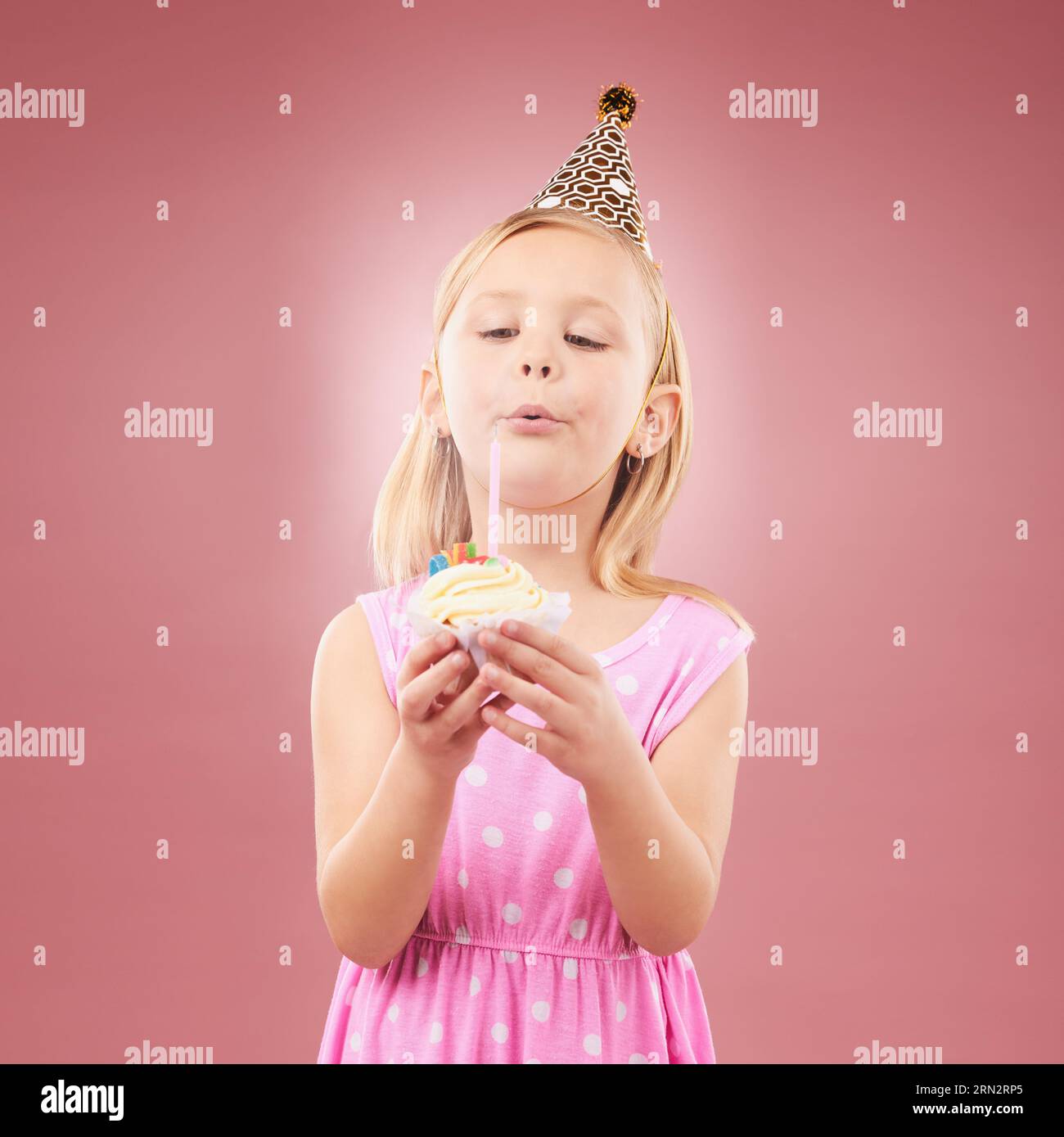 Blow candle, birthday and child with cupcake for holiday party, happy