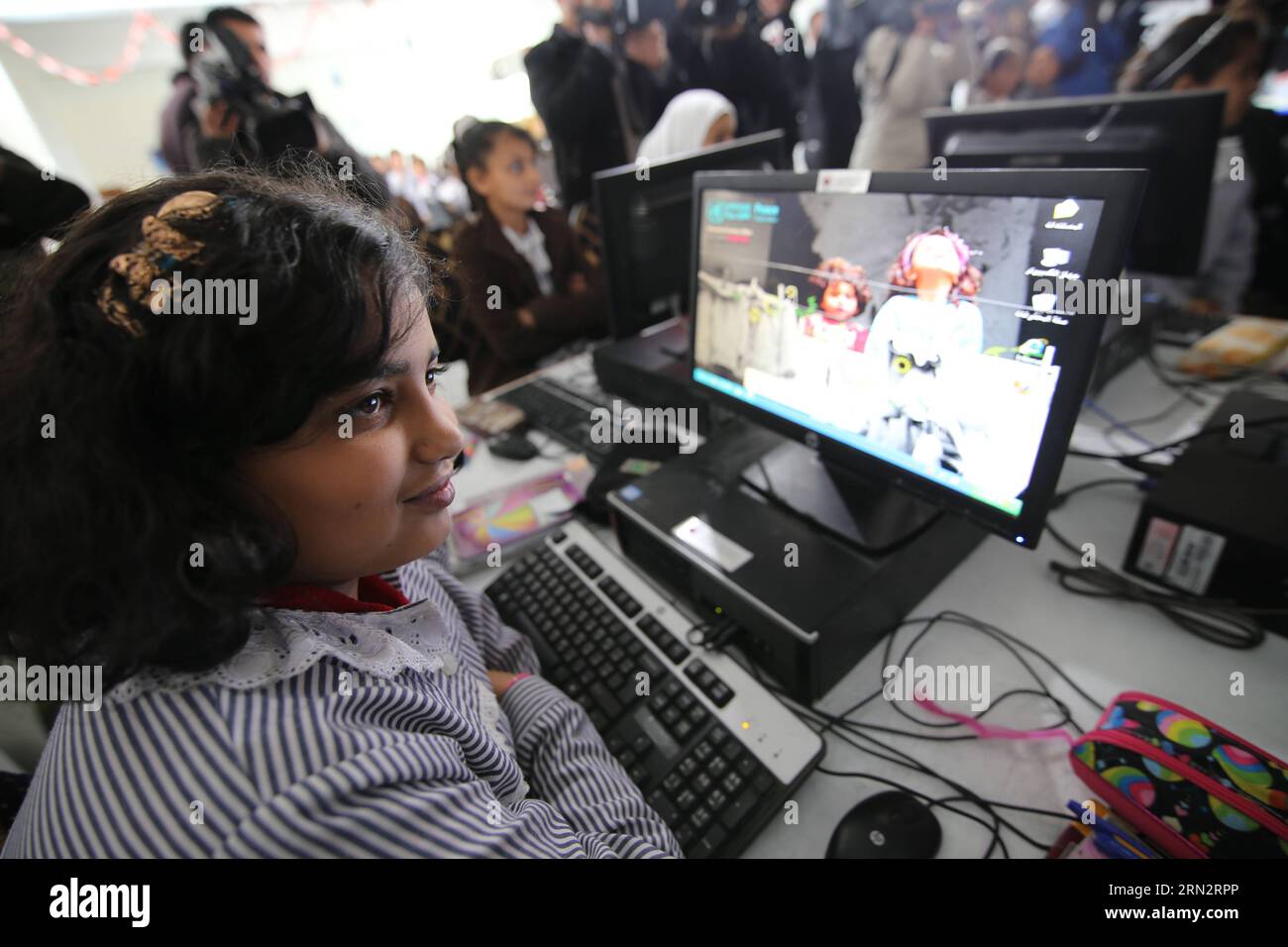 (150322) -- GAZA, March 22, 2015 -- A Palestinian student attends a lesson in a computer laboratory at a UN-run school which is reopened after it was damaged during the war between Israel and Hamas militants in Khuzaa village of the southern Gaza Strip city of Khan Yunis, on March 22, 2015. ) MIDEAST-GAZA-REOPEN-SCHOOL KhaledxOmar PUBLICATIONxNOTxINxCHN   Gaza March 22 2015 a PALESTINIAN Student Attends a Lesson in a Computer Laboratory AT a UN Run School Which IS reopened After IT what damaged during The was between Israel and Hamas militant in  Village of The Southern Gaza Strip City of Khan Stock Photo
