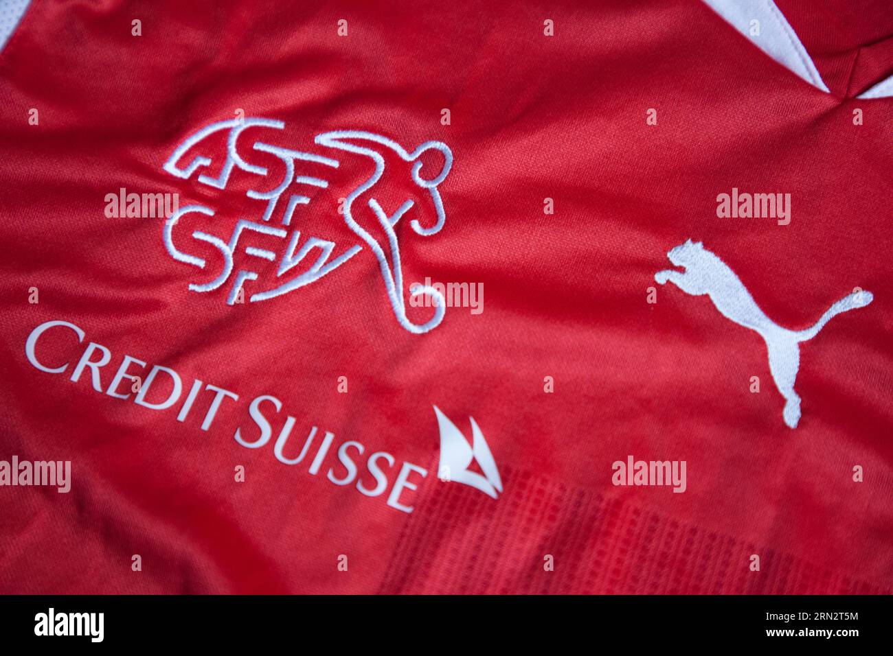 Puma Logo, Credit Suisse and Swiss Football Association emblem on a Swiss national football shirt Stock Photo