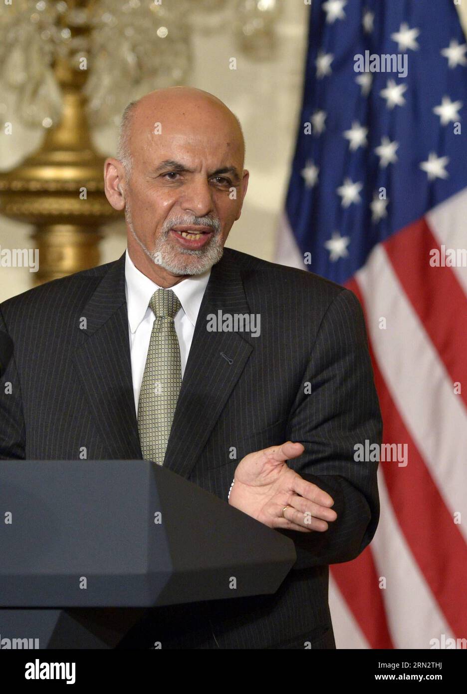 (150324) -- WASHINGTON D.C., March. 24, 2015 -- Afghan President Ashraf Ghani speaks at a joint press conference in the East Room of White House in Washington D.C., the United States, March 24, 2015. U.S. President Barack Obama announced Tuesday no drawdown of the current 9,800 U.S. troops stationed in Afghanistan will occur through the end of 2015. ) U.S.-WASHINGTON D.C.-OBAMA-GHANI-PRESS CONFERENCE YinxBogu PUBLICATIONxNOTxINxCHN   Washington D C March 24 2015 Afghan President Ashraf Ghani Speaks AT a Joint Press Conference in The East Room of White House in Washington D C The United States Stock Photo