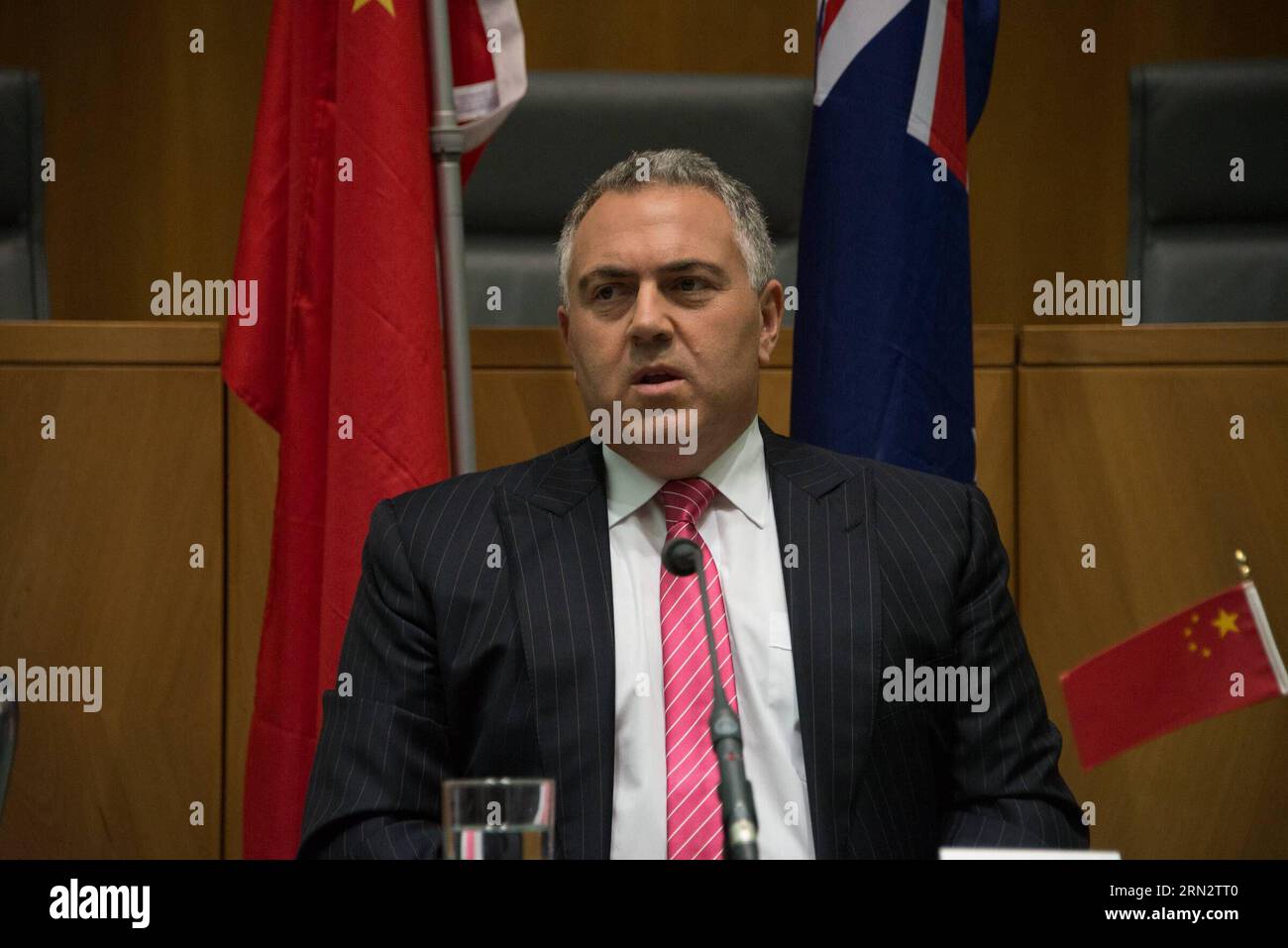 (150325) -- CANBERRA, March 25, 2015 -- Australian Treasurer Joe Hockey (C) speaks during the launching meeting of Australian China Business Council (ACBC) s 2014 Australia-China Trade Report at the Parliament House in Canberra, Australia, March 25, 2015. Joe Hockey, an early proponent of the bank in Australia, said on Wednesday Australia would do its best to meet next Tuesday s deadline. ) (djj) AUSTRALIA-CANBERRA-AIIB JustinxQian PUBLICATIONxNOTxINxCHN   Canberra March 25 2015 Australian Treasurer Joe Hockey C Speaks during The Launching Meeting of Australian China Business Council  S 2014 A Stock Photo