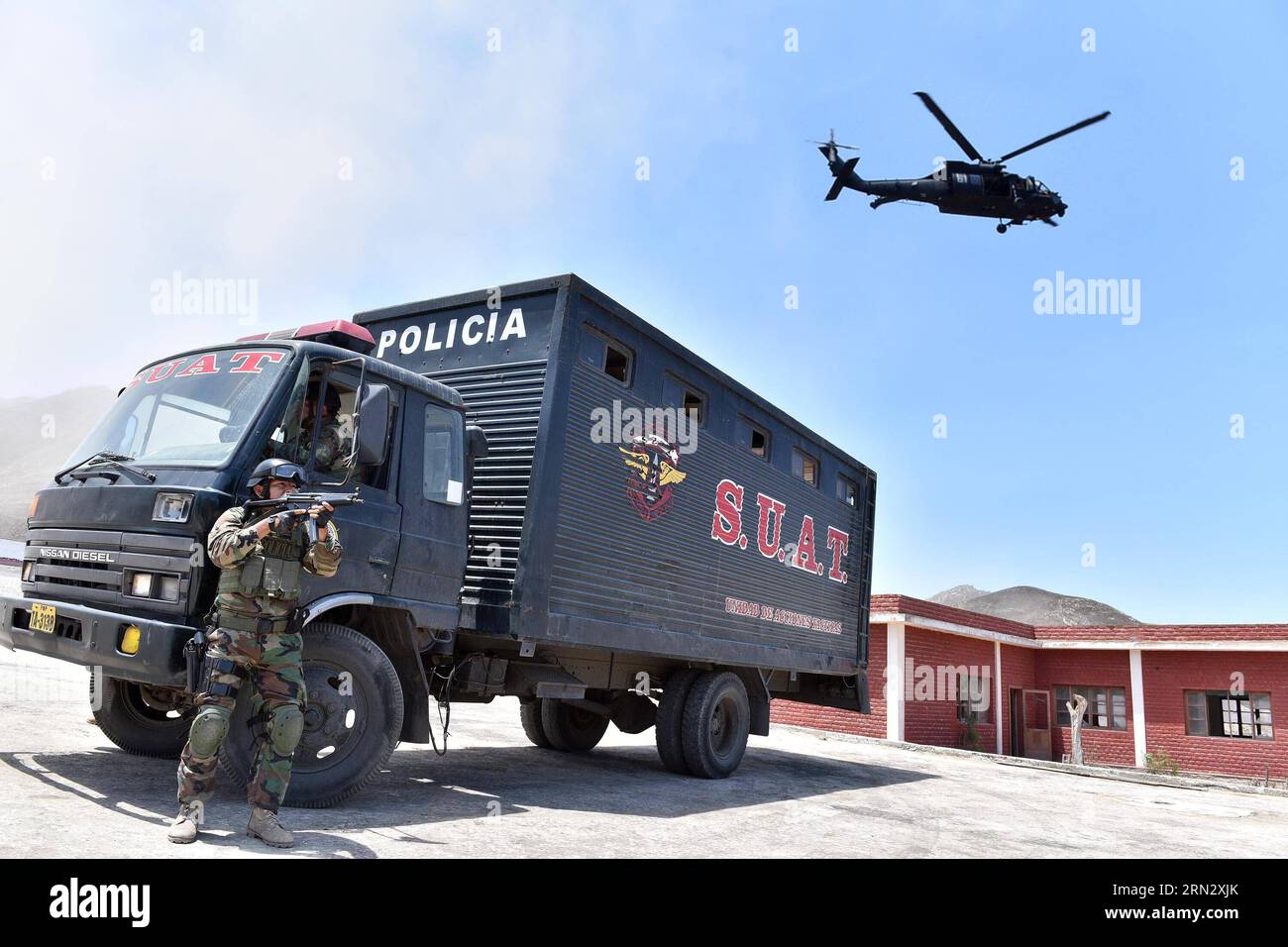 (150327) -- LIMA, March 27, 2015 -- Image provided by Peru s Ministry of Interior show Urban Tactical Direction (SUAT, for its acronym in spanish) of Peru s National Polica agents attending a drill in Lima City, capital of Peru, on March 27, 2015. According to local press, Peru s Ministry of Interior informed Friday that instructors of special forces of the U.S. Army trained SUAT agents for six weeks in new tactics and techniques of hostage rescue, advanced marksmanship, close combat, planification, vehicle intervention, infiltration, etc. Peru s Ministry of Interior) (azp) PERU-LIMA-US-MILITA Stock Photo