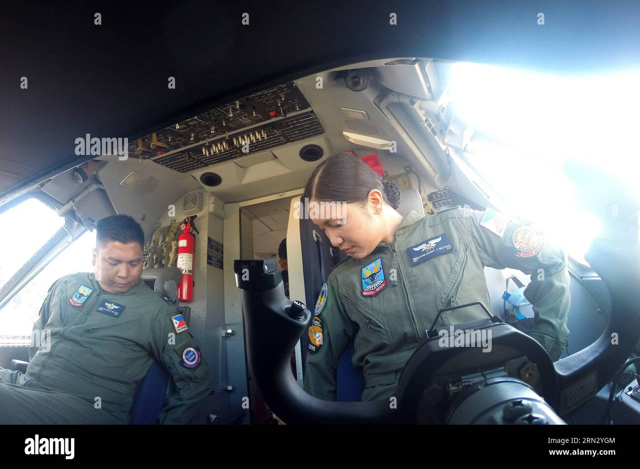 Pilots from the Philippine Air Force (PAF) take a seat at the cockpit