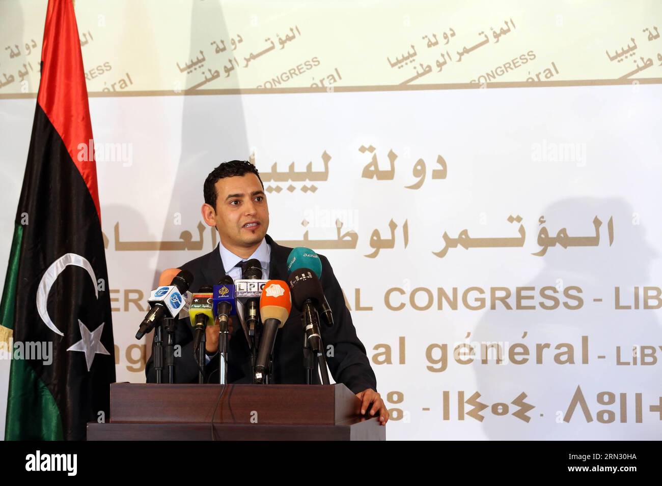 (150331) -- TRIPOLI, March 31, 2015 -- Omar Hemidan, spokesman of the General National Congress (GNC), Libya s Islamist-backed parliament, addresses a press conference in Tripoli, Libya, on March 31, 2015. Hamidan announced on Tuesday that Libya s Islamist-backed government headed by Prime Minister Omar Hassi was dismissed. ) LIBYA-TRIPOLI-ISLAMIST-BACKED-GOVERNMENT-DISMISSED HamzaxTurkia PUBLICATIONxNOTxINxCHN   Tripoli March 31 2015 Omar  spokesman of The General National Congress GNC Libya S Islamist Backed Parliament addresses a Press Conference in Tripoli Libya ON March 31 2015  announced Stock Photo