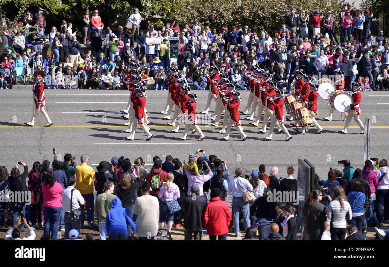 (150411) -- WASHINGTON D.C., April 11, 2015 -- Soldiers of a military band attend the annual Cherry Blossom Festival Parade along the Constitution Avenue in Washington D.C., capital of the United States, April 11, 2015. The parade is one of the US capital s biggest public events, drawing about 100,000 spectators from around the world. ) U.S.-WASHINGTON D.C.-CHERRY BLOSSOM-FESTIVAL YinxBogu PUBLICATIONxNOTxINxCHN   Washington D C April 11 2015 Soldiers of a Military Tie attend The Annual Cherry Blossom Festival Parade Along The Constitution Avenue in Washington D C Capital of The United States Stock Photo