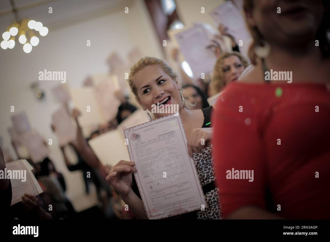 (150411) -- MEXICO CITY, April 11, 2015 -- Paulo Herrera reacts at the end of a handing over ceremony of birth certificates for transgendered people in the Legislative Assembly of Federal District (ALDF, for its acronym in Spanish), in Mexico City, capital of Mexico, on April 11, 2015. 31-year-old Paulo, a hair stylist living in Mexico City, received on Saturday the birth certificate that accredits him as Paula Herrera and female. Pedro Mera) (jp) MEXICO-MEXICO CITY-SOCIETY-TRANSGENDER-BIRTH CERTIFICATE e PedroxMera PUBLICATIONxNOTxINxCHN   Mexico City April 11 2015 Paulo Herrera reacts AT The Stock Photo