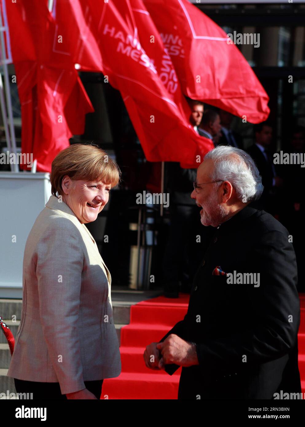 (150412) -- HANOVER, April 12, 2015 -- German Chancellor Angela Merkel (L) and Indian Prime Minister Narendra Modi attend the opening ceremony of 2015 Hanover Industrial Trade Fair in Hanover, Germany, on April 12, 2015. The annual Hanover Industrial Fair, Hannover Messe, officially opened on Sunday night, focusing for the third year in a row on the integration of conventional industry and IT sector. ) (CORRECTION)GERMANY-HANOVER-INDUSTRIAL TRADE FAIR-OPENING LuoxHuanhuan PUBLICATIONxNOTxINxCHN   Hanover April 12 2015 German Chancellor Angela Merkel l and Indian Prime Ministers Narendra Modes Stock Photo