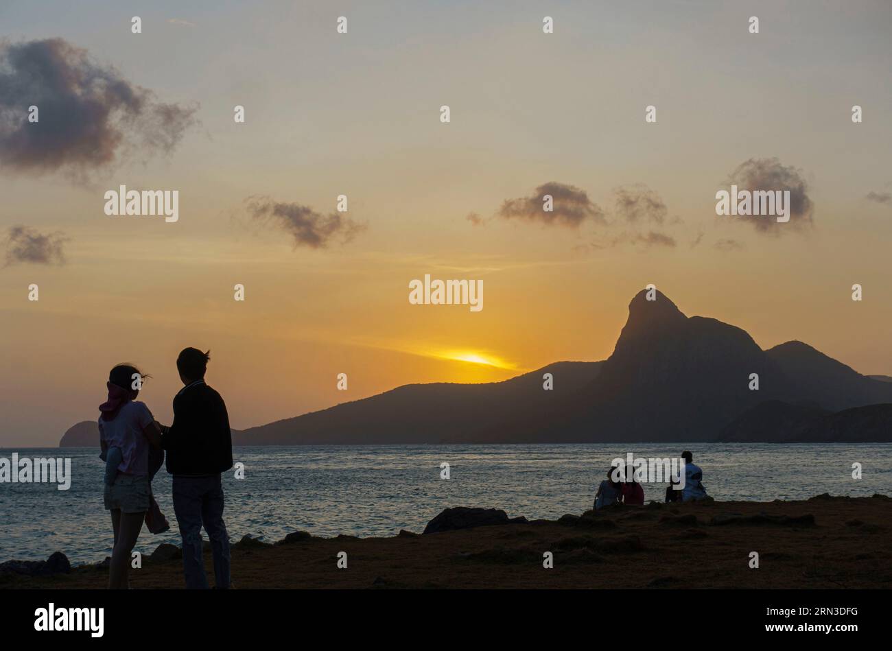 Vietnam, Archipelago of Con Dao, called Poulo-Condore islands during french colonization, Con Son island, vietnamese tourists taking selfies Stock Photo