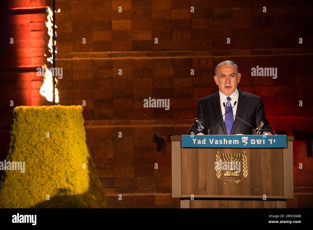 (150415) -- JERUSALEM, April 15, 2015 -- Israeli Prime Minister Benjamin Netanyahu addresses an annual ceremony marking Holocaust Remembrance Day at the Yad Vashem Holocaust Memorial Museum in Jerusalem, on April 15, 2015. Israel marked its annual Holocaust Remembrance day with an official ceremony held in Jerusalem late on Wednesday. Six Holocaust survivors, each representing one million of the six million Jews killed in the holocaust, lighted six torches at the ceremony in Jerusalem s Yad Vashem Holocaust Memorial Museum. From Wednesday sunset to Thursday, Israel will officially commemorate Stock Photo