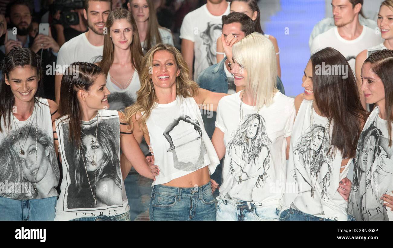SAO PAULO, April 15, 2015 -- Brazilian supermodel Gisele Bundchen (3rd L, front) reacts with other models during a fashion show of Colcci on Sao Paulo Fashion Week in Sao Paulo, Brazil, April 15, 2015. Gisele Bundchen made her last catwalk stroll down Wednesday night, putting an farewell to her 20-year career which has made her a legend in fashion industry. The 34-year-old Brazilian woman is currently the world s highest-paid model according to a Forbes magazine ranking in 2014. ) (bxq) BRAZIL-SAO PAULO-GISELE BUNDCHEN RETIRES XuxZijian PUBLICATIONxNOTxINxCHN   Sao Paulo April 15 2015 Brazilia Stock Photo
