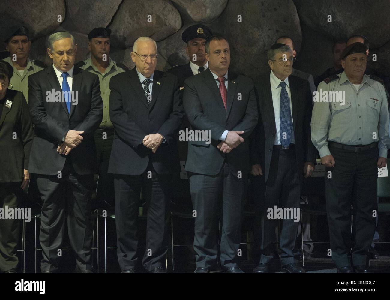 (150416) -- JERUSALEM, April 16, 2015 -- Israeli Prime Minister Benjamin Netanyahu (2nd L, front) and President Reuven Rivlin (3rd L, front) mourn for holocaust victims during the Holocaust Remembrance Day at the Yad Vashem Holocaust Memorial Museum in Jerusalem, on April 16, 2015. From Wednesday sunset to Thursday, Israel officially commemorated the genocide of six million Jews by Nazi Germany during the World War II. GPO/) (djj) MIDEAST-JERUSALEM-HOLOCAUST REMEMBRANCE DAY AmosxBenxGershom PUBLICATIONxNOTxINxCHN   Jerusalem April 16 2015 Israeli Prime Ministers Benjamin Netanyahu 2nd l Front Stock Photo