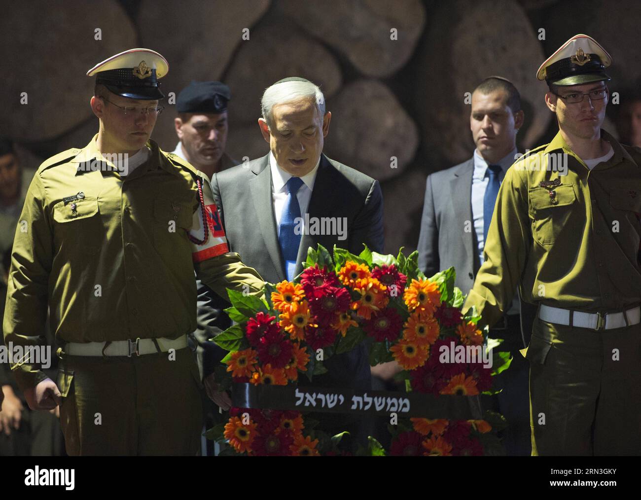 (150416) -- JERUSALEM, April 16, 2015 -- Israeli Prime Minister Benjamin Netanyahu (C) lays a wreath for holocaust victims during the Holocaust Remembrance Day at the Yad Vashem Holocaust Memorial Museum in Jerusalem, on April 16, 2015. From Wednesday sunset to Thursday, Israel officially commemorated the genocide of six million Jews by Nazi Germany during the World War II. GPO/) (djj) MIDEAST-JERUSALEM-HOLOCAUST REMEMBRANCE DAY AmosxBenxGershom PUBLICATIONxNOTxINxCHN   Jerusalem April 16 2015 Israeli Prime Ministers Benjamin Netanyahu C Lays a  for Holocaust Victims during The Holocaust Remem Stock Photo