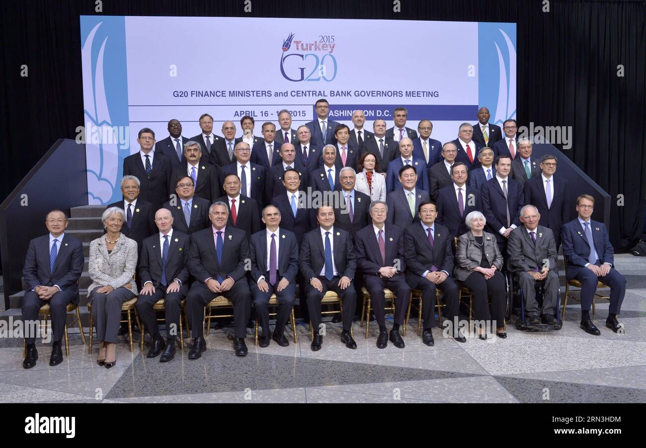 (150417) -- WASHINGTON D.C., April 17, 2015 -- Finance ministers and central bankers of the G20 pose for a family photo with IMF Managing Director Christine Lagarde (2nd L, front) during the IMF and World Bank spring meetings in Washington D.C., capital of the United States, April 17, 2015. The Group of 20 leading economies (G20) remained deeply disappointed with the continued delay in progressing the 2010 International Monetary Fund (IMF) quota reform, G20 finance ministers and central bank governors said in a communique on Friday. ) U.S.-WASHINGTON-WORLD BANK GROUP-IMF-ANNUAL MEETINGS YinxBo Stock Photo