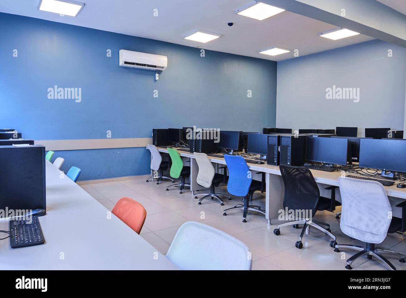 empty computer lab in a university. Computer lab room. room with a lot ...