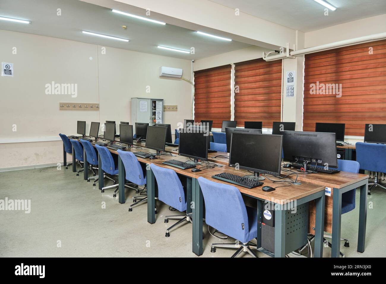 empty computer lab in a university. Computer lab room. room with a lot ...
