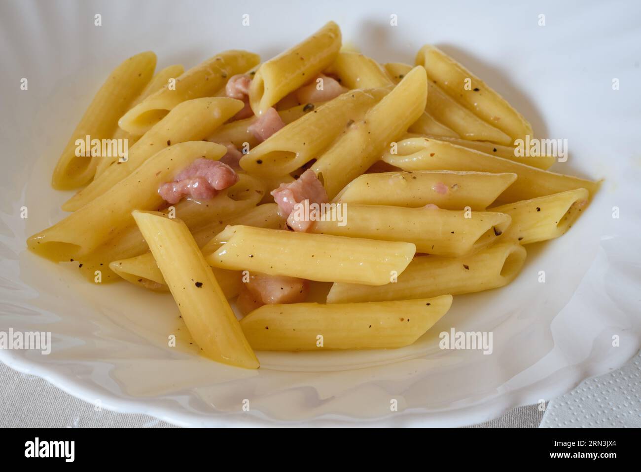 Italian Pasta Alla Carbonara Sauce Stock Photo - Alamy
