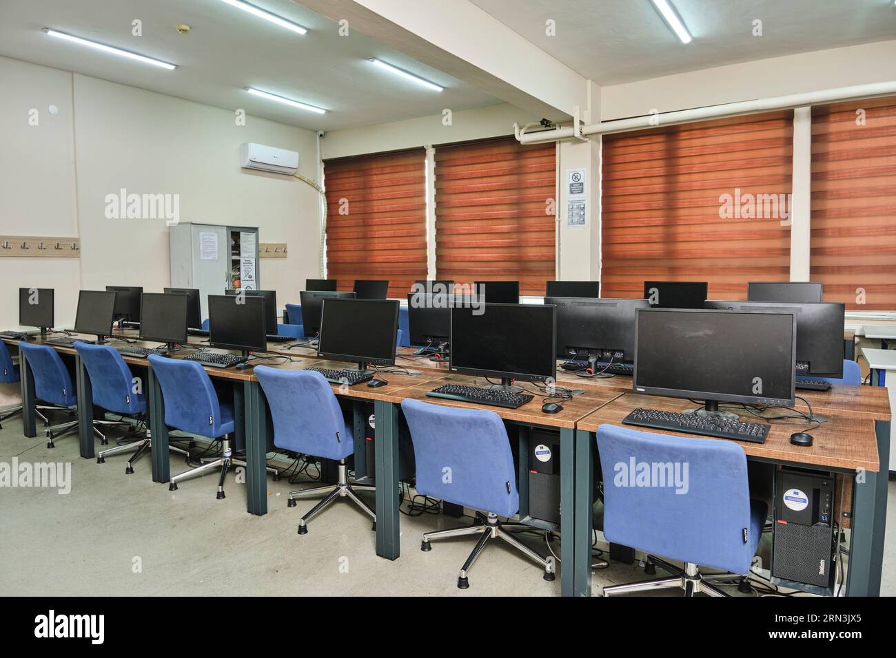empty computer lab in a university. Computer lab room. room with a lot ...