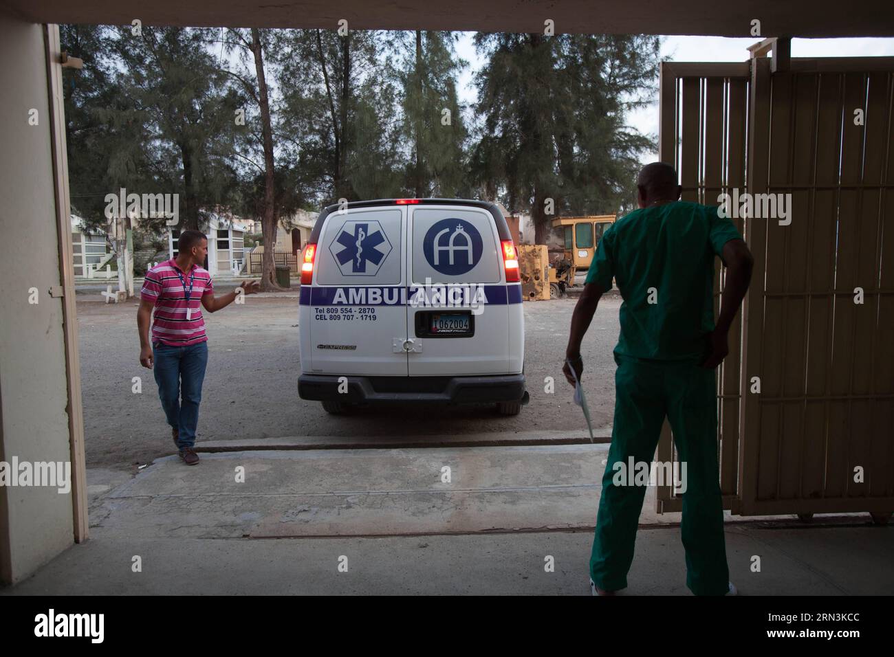(150421) -- SANTO DOMINGO, April 20, 2015 -- The vehicle that moves the bodies of the victims of a plane accident, enters the Pathology Center of the Cristo Redentor Cementery, in Santo Domingo, Dominican Republic, on April 20, 2015. Four Spanish and two British tourists died in the accident of a plane that occurred on Monday in Dominican Republic, local authorities confirmed. The accident happened after 08:00, local hour, when the type PA-32 plane, registration number HI-957, precipitated to the ground and caught fire, close to a residential zone of the touristic locality of Punta Cana, leavi Stock Photo