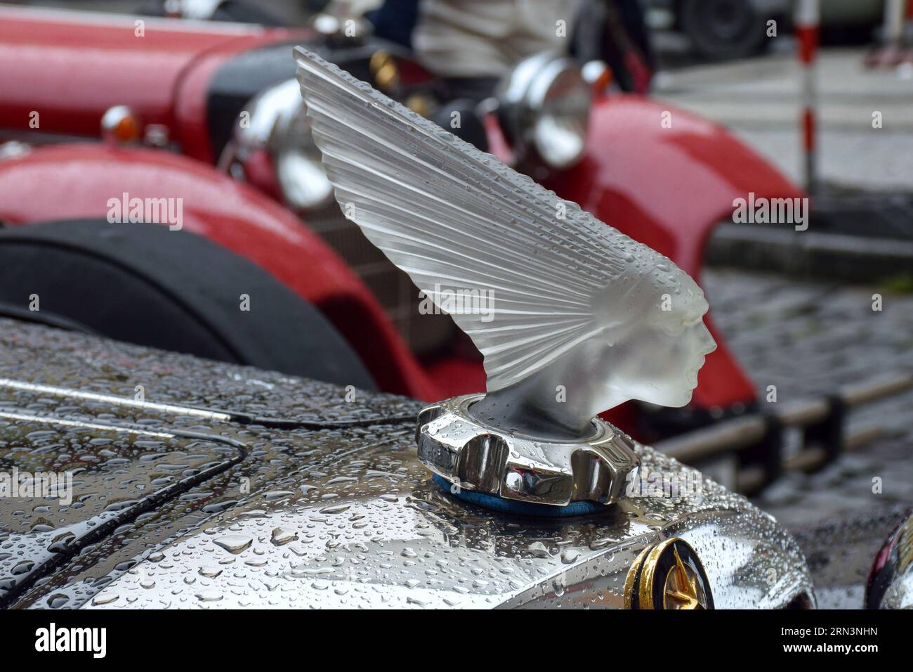 Closeup of a black oldtimer, showing the emblem with logo Stock Photo ...