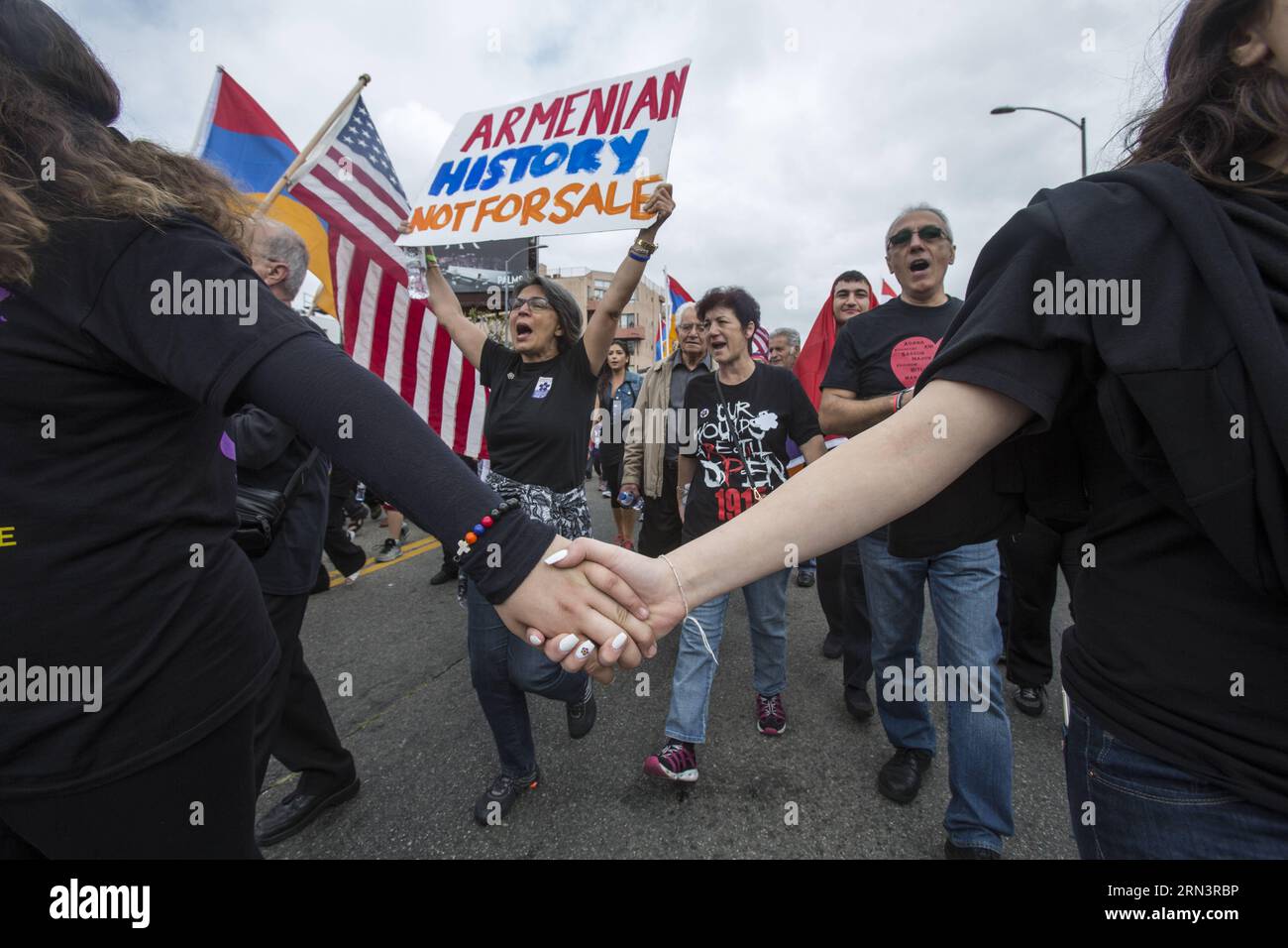 (150425) -- LOS ANGELES, Apr. 25, 2015 -- A woman holds a placard during the rally marking the 100th anniversary of a genocide against the Armenians, in Los Angeles, the United States, on April 25, 2015. Demonstrators holding placards and national flags of Armenia marched to the consulate of Turkey in Los Angeles to mark the 100th anniversary of a genocide against the Armenians. ) (zhf) US-LOS ANGELES-ARMENIA-GENOCIDE-100TH ANNIVERSARY-RALLY ZhaoxHanrong PUBLICATIONxNOTxINxCHN   Los Angeles Apr 25 2015 a Woman holds a placard during The Rally marking The 100th Anniversary of a Genocide against Stock Photo