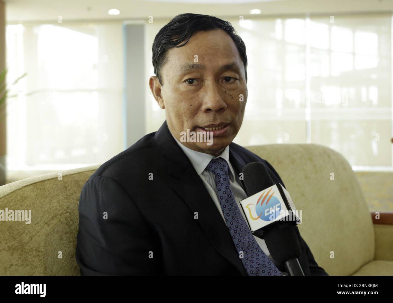 (150425) -- YANGON, April 25, 2015 -- Chairman of Myanmar s ruling Union Solidarity and Development Party (USDP) U Shwe Mann receives an interview by Xinhua News Agency before paying a goodwill visit to China at the Yangon International airport in Yangon, Myanmar, on April 25, 2015. U Shwe Mann on Saturday highly appreciated China s Belt and Road initiative which is aimed at rejuvenating two ancient trade routes and further opening up markets within and beyond the region. ) MYANMAR-YANGON-CHINA-U SHWE MANN UxAung PUBLICATIONxNOTxINxCHN   Yangon April 25 2015 Chairman of Myanmar S ruling Union Stock Photo