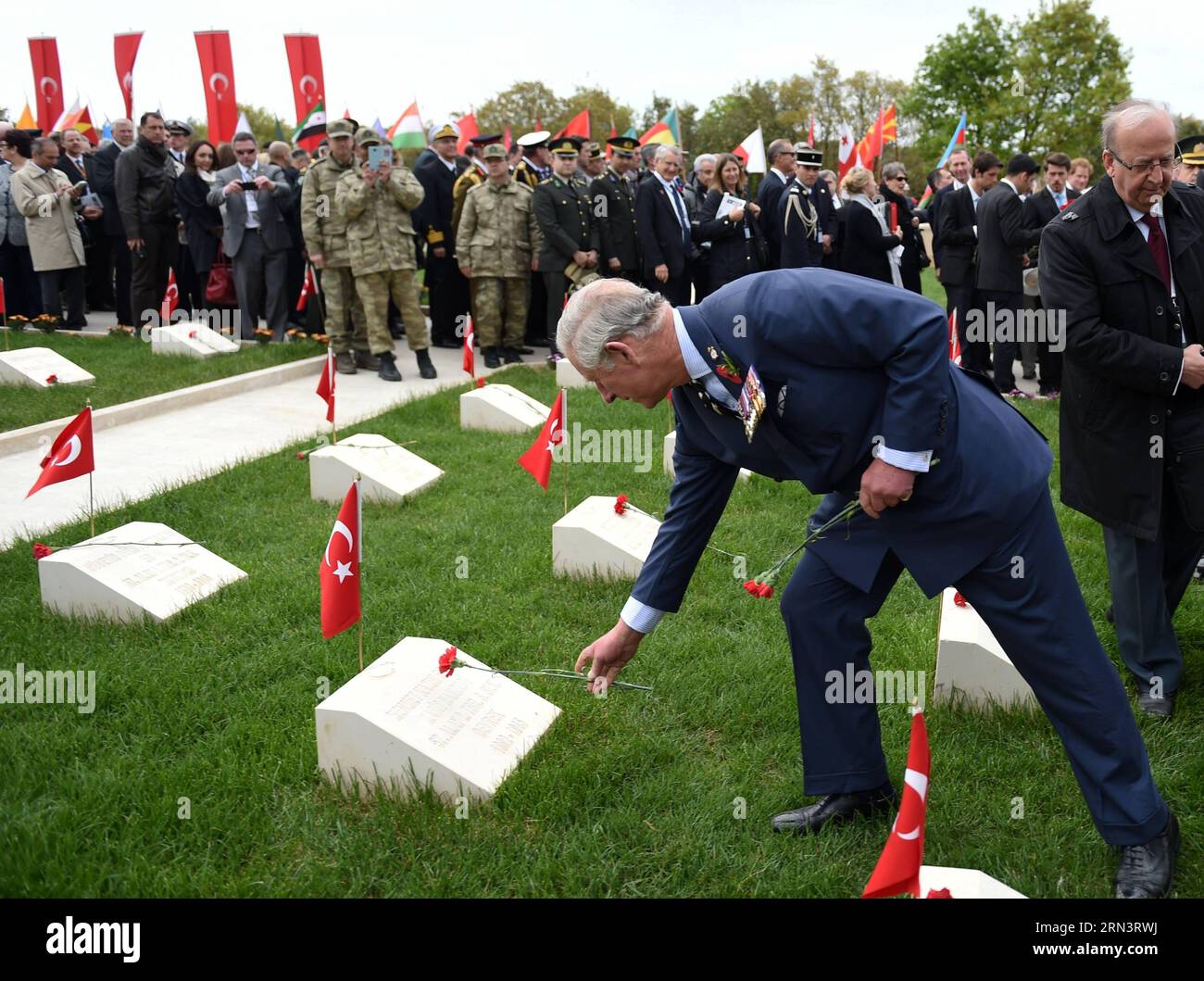 British Prince of Wales Charles presents a flower at the 57th Infantry Regiment Memorial in Canakkale, Turkey, April 25, 2015. Leaders and dignitaries from the UK, Ireland, Australia and New Zealand joined Turkish military delegates to attend Turkish memorial service on Saturday at the 57th Infantry Regiment Memorial, as an event of 100th anniversary of the Gallipoli Battle. ) TURKEY-CANAKKALE-TURKISH MEMORIAL SERVICE HexCanling PUBLICATIONxNOTxINxCHN   British Prince of Wales Charles Presents a Flower AT The 57th Infantry Regiment Memorial in Canakkale Turkey April 25 2015 Leaders and dignita Stock Photo