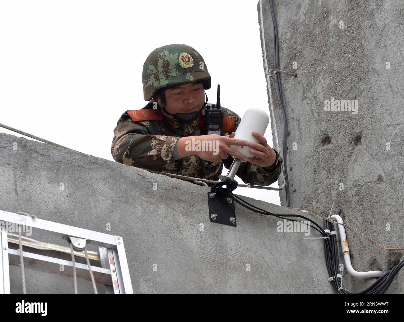 Soldier on satellite phone hi-res stock photography and