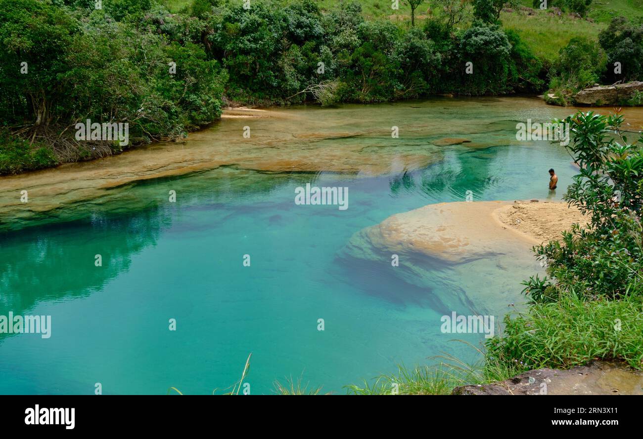 Teal blue natural pool Stock Photo - Alamy