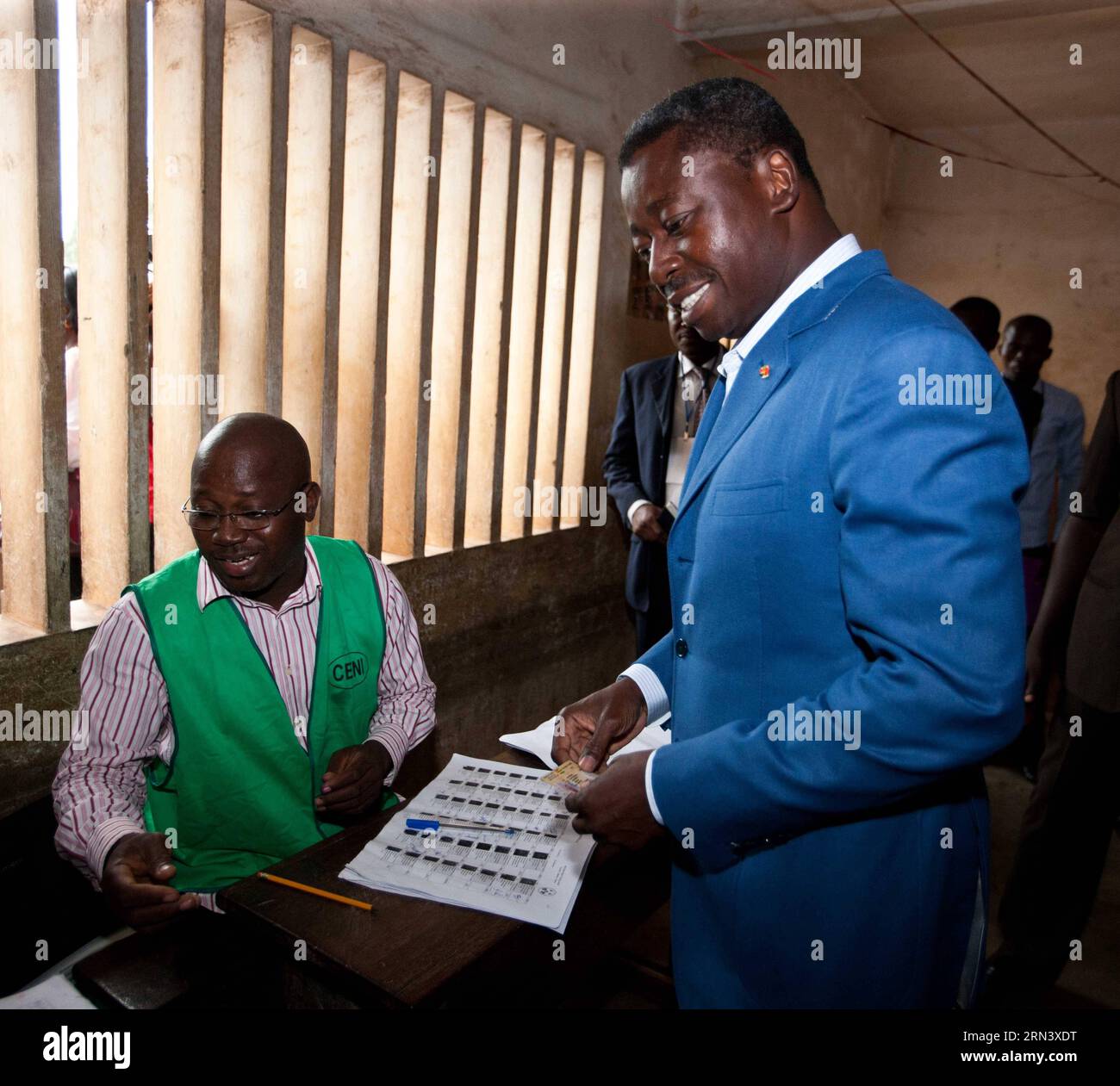 (150428) -- LOME, April 28, 2015 -- Photo taken on April 25, 2015 shows the incumbent president of Togo Faure Essozimna Gnassingbe casting his ballot at a station during the presidential election in Lome, capital of Togo. Faure Essozimna Gnassingbe won the country s presidential election in the votes held on Saturday, according to preliminary results on Tuesday. ) TOGO-LOME-PRESIDENTIAL ELECTION-FAURE-VICTORY LixJing PUBLICATIONxNOTxINxCHN   Lome April 28 2015 Photo Taken ON April 25 2015 Shows The incumbent President of Togo Faure Essozimna Gnassingbe Casting His Ballot AT a Station during Th Stock Photo