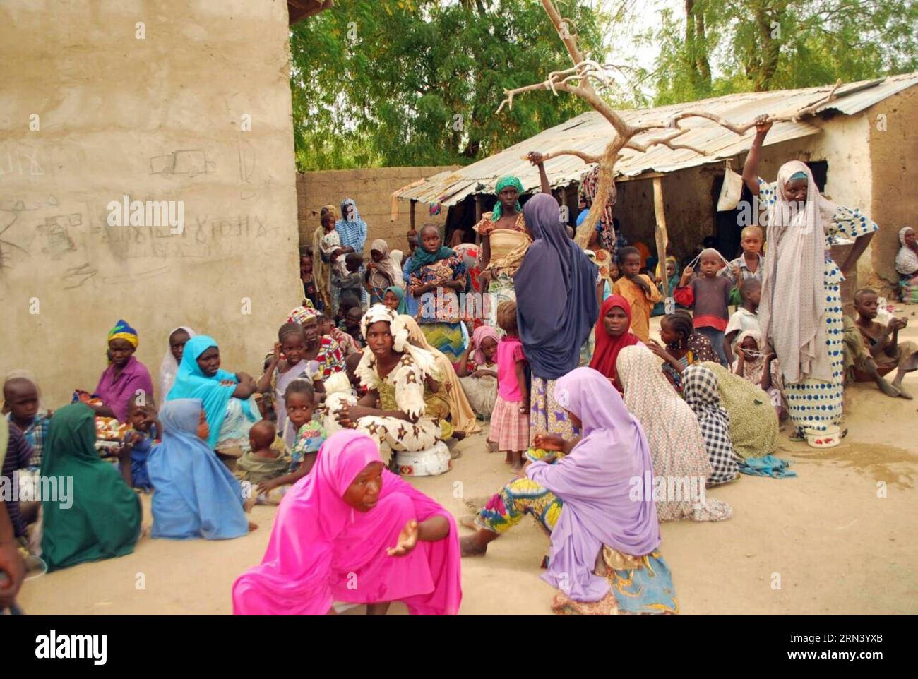 (150430) -- SAMBISA, April 30, 2015 -- Some of the rescued hostages by the Nigerian troops are seen at a camp in Sambisa forest, North-Eastern Nigeria, April 30, 2015. Up to 300 unidentified females have been rescued by Nigerian troops in restive northeast Sambisa forest following a daring and precise operation, a military spokesperson said on Tuesday. ) NIGERIA-SAMBISA-HOSTAGES-RESCUE Dare PUBLICATIONxNOTxINxCHN   April 30 2015 Some of The Rescued Hostages by The Nigerian Troops are Lakes AT a Camp in  Forest North Eastern Nigeria April 30 2015 up to 300 unidentified females have been Rescued Stock Photo
