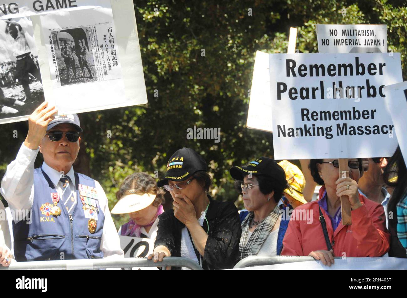 Protesters from Korean community are seen in a demonstration against visiting Japanese Prime Minister Shinzo Abe in Stanford University, California, the United States, on April 30, 2015. Over one hundred Chinese and Korean Americans gathered outside Stanford Unviersity s Bing Concert Hall and urged visiting Japanese Prime Minister Shinzo Abe to stop distorting history when he arrived there for a speech on campus. )(azp) US-CALIFORNIA-STANDFORD-JAPAN PM-SPPECH xuxyong PUBLICATIONxNOTxINxCHN   protesters from Korean Community are Lakes in a Demonstration against Visiting Japanese Prime Ministers Stock Photo