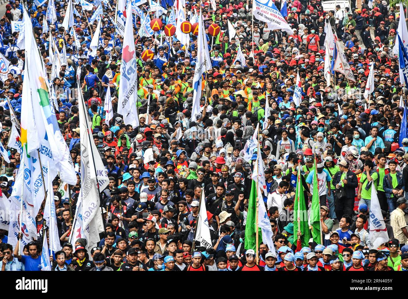(150501) -- JAKARTA, May 1, 2015 -- Workers march on the Thamrin street during a celebration marking International Labor Day in Jakarta, Indonesia, May 1, 2015. More than a hundred thousand of Indonesian workers gather at the main street in Jakarta and parade to the President Palace to celebrate International Labor Day. ) INDONESIA-JAKARTA-INTERNATIONAL LABOR DAY VerixSanovri PUBLICATIONxNOTxINxCHN   Jakarta May 1 2015 Workers March ON The Thamrin Street during a Celebration marking International Laboratory Day in Jakarta Indonesia May 1 2015 More than a Hundred Thousand of Indonesian Workers Stock Photo