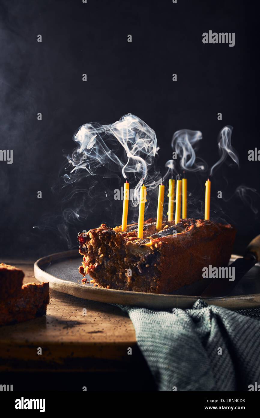 Birthday cake smoking candle hi-res stock photography and images