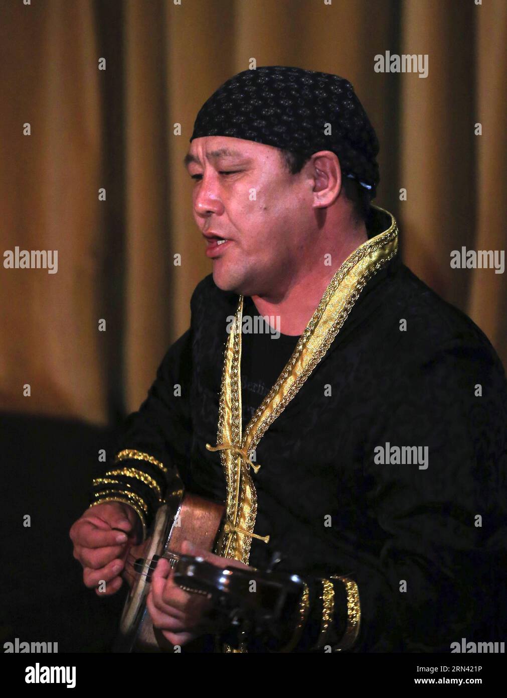 Hosso performs Hoomii (Mongolian traditional throat singing) at the International Theater in