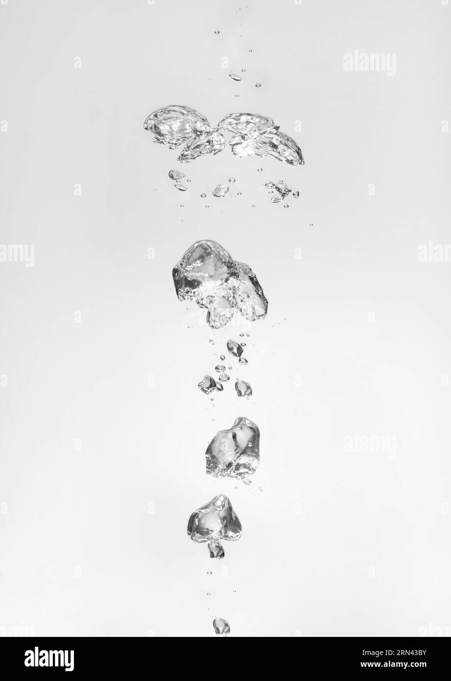 Air bubbles in water on white background Stock Photo