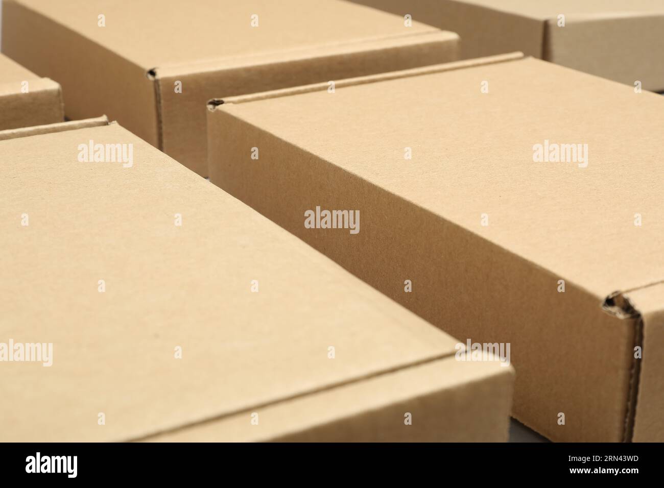 Many cardboard boxes, closeup view. Packaging goods Stock Photo Alamy