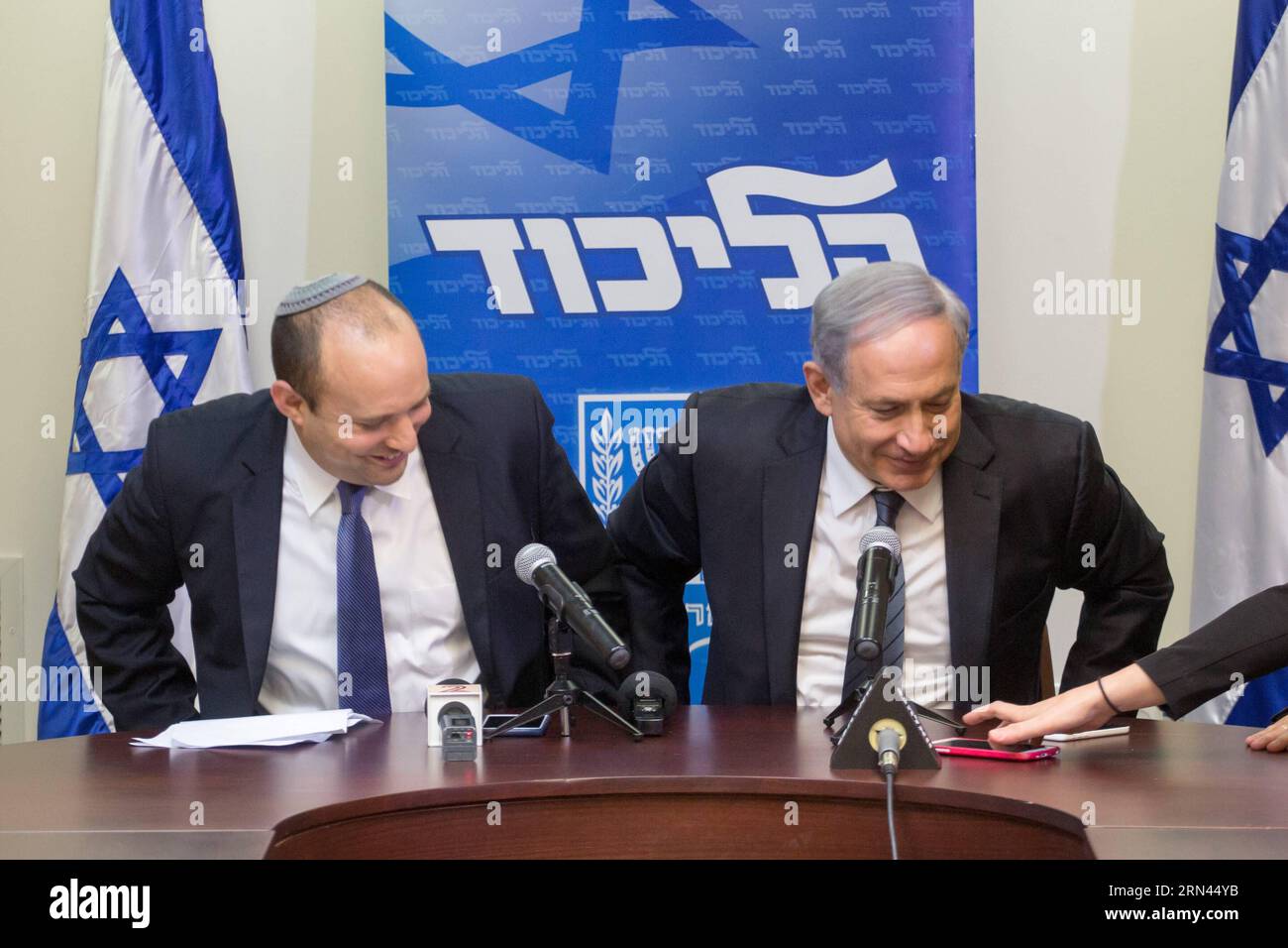 (150507) -- JERUSALEM, May 6, 2015 -- Israeli Prime Minister Benjamin Netanyahu (R) and Jewish Home party leader Naftali Bennett hold a press conference in Jerusalem May 6, 2015. Benjamin Netanyahu managed to clinch a deal with the nationalist Jewish Home party late Wednesday night, securing a new ruling coalition with a tiny majority in the 120-member parliament. ) ISRAEL-NEW COALITION-PRESS CONFERENCE JINI PUBLICATIONxNOTxINxCHN   Jerusalem May 6 2015 Israeli Prime Ministers Benjamin Netanyahu r and Jewish Home Party Leader Naftali Bennett Hold a Press Conference in Jerusalem May 6 2015 Benj Stock Photo