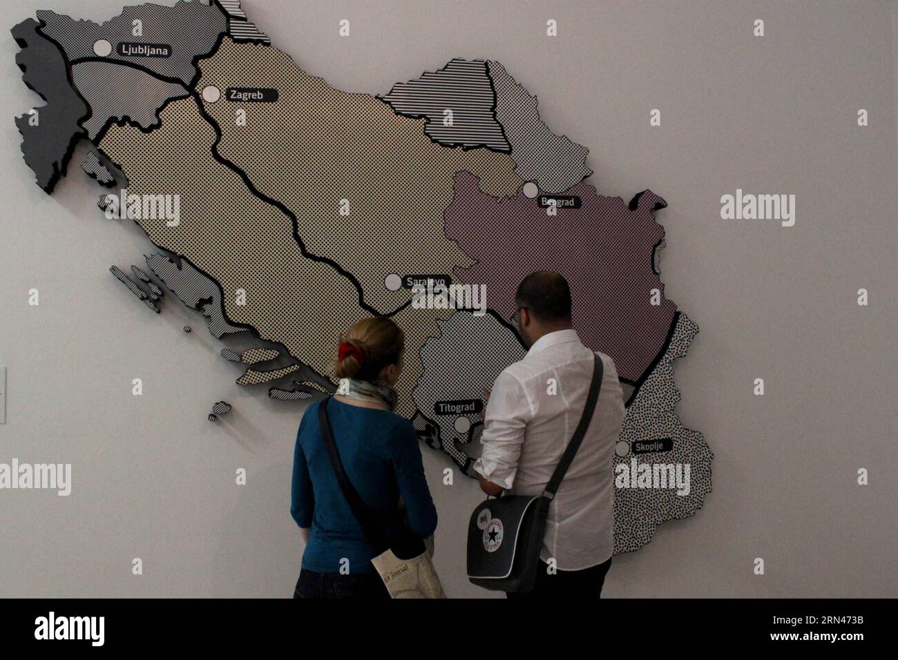 (150509) -- BELGRADE, May 9, 2015 -- Visitors look at a map depicting occupied Yugoslavia in World War II at the exhibition Art as Resistance to Fascism at the Museum of History of Yugoslavia in Belgrade, Serbia on May 9, 2015. The exhibition kicked off to mark the 70th anniversary of Victory Day over Fascism. ) SERBIA-BELGRADE-VICTORY DAY-EXHIBITION NemanjaxCabric PUBLICATIONxNOTxINxCHN   150509 Belgrade May 9 2015 Visitors Look AT a Map depicting occupied Yugoslavia in World was II AT The Exhibition Art As Resistance to Fascist AT The Museum of History of Yugoslavia in Belgrade Serbia ON May Stock Photo