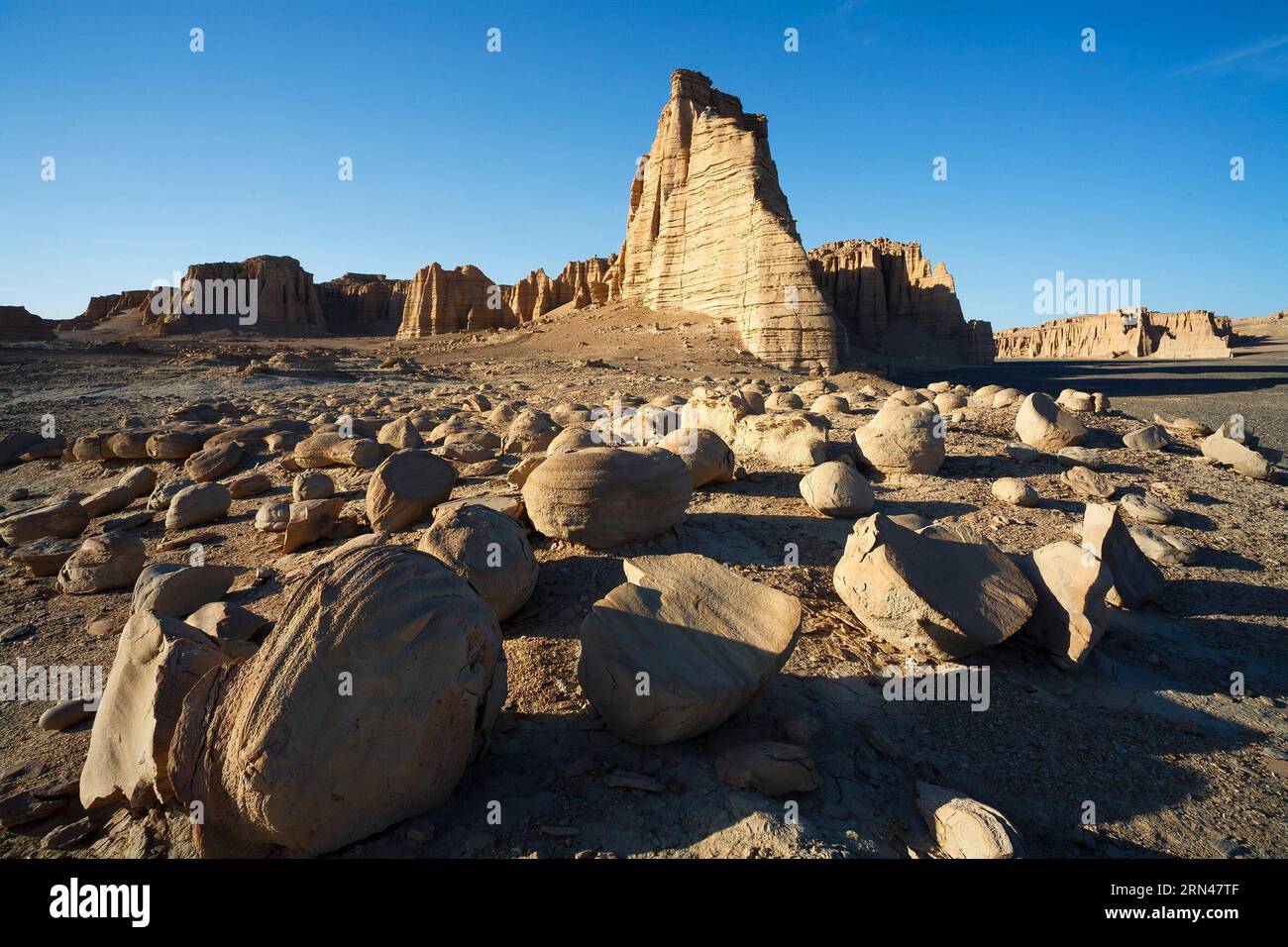 Photo taken on Oct. 5, 2012 shows the Yadan landform in Hami, northwest China s Xinjiang Uygur Autonomous Region. ) (zwx) CHINA-XINJIANG-HAMI-YADAN LANDFORM(CN) LixHua PUBLICATIONxNOTxINxCHN   Photo Taken ON OCT 5 2012 Shows The Yadan Landform in Hami Northwest China S Xinjiang Uygur Autonomous Region zwx China Xinjiang Hami Yadan Landform CN LixHua PUBLICATIONxNOTxINxCHN Stock Photo